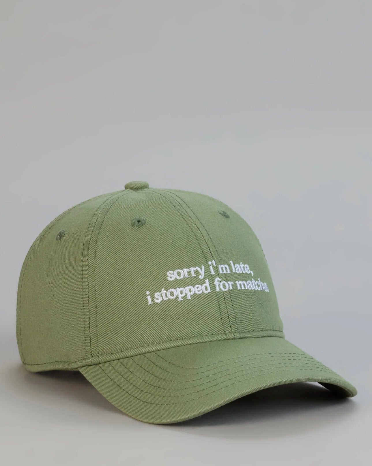 sorry i’m late cap -green/white