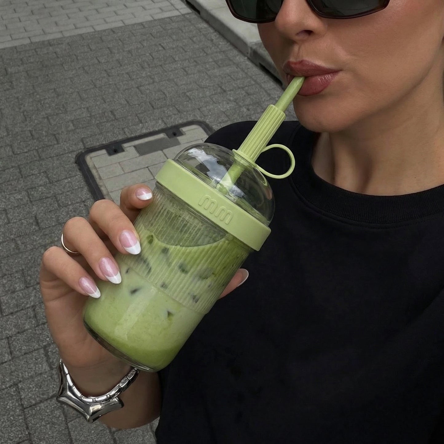The Matcha Machine takeout cup